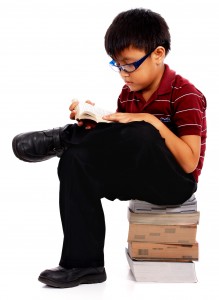 Intelligent Boy Reading A Book