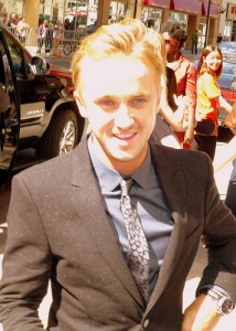 Photo Credit: Gabbo T via flickr CC-BY-SA  Tom Felton doesn't look so inimical in this photo. 