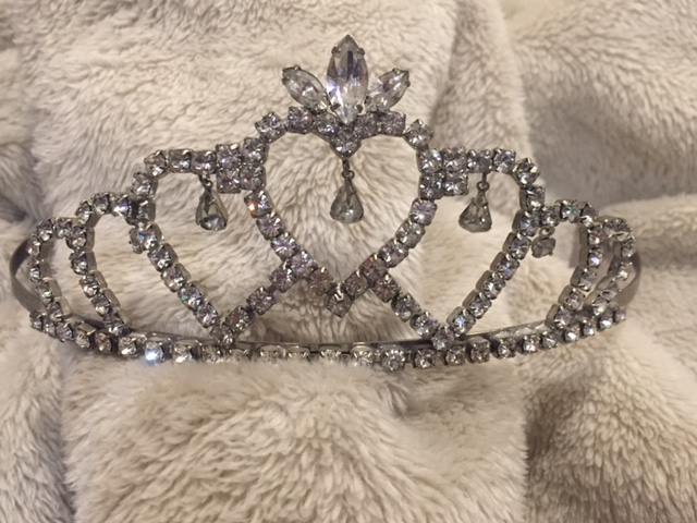 The coveting Homecoming Queen crown. I never wore won, but my friend Heather has two! She's royalty! ;) 