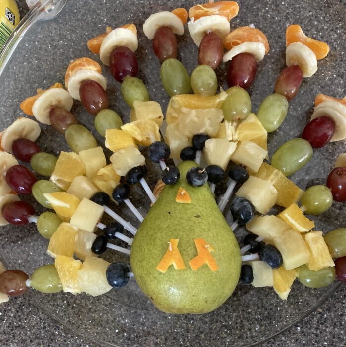 Photo of a turkey made from assorted fruits